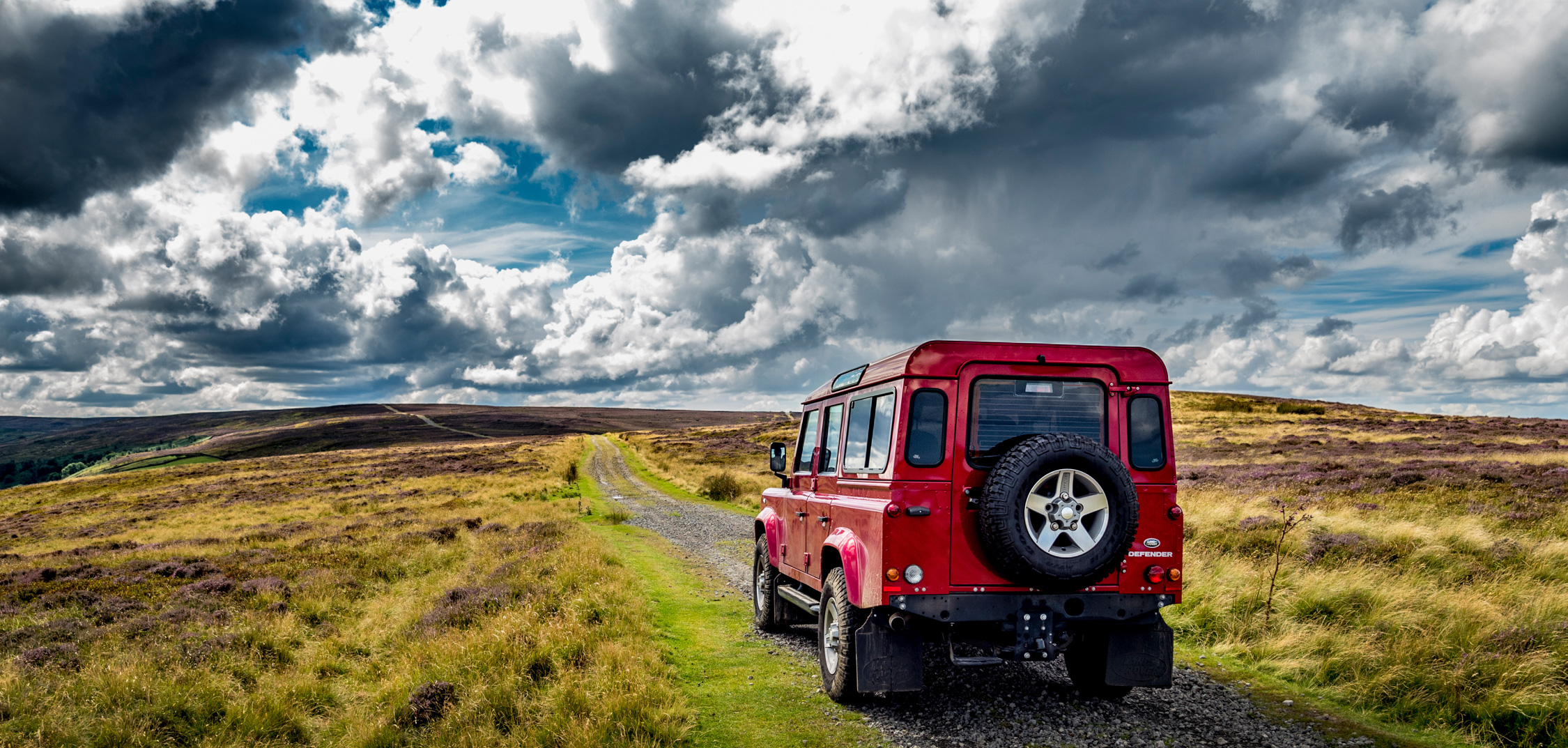 Car shot in a rural environment using a standard lens give a natural perspective.